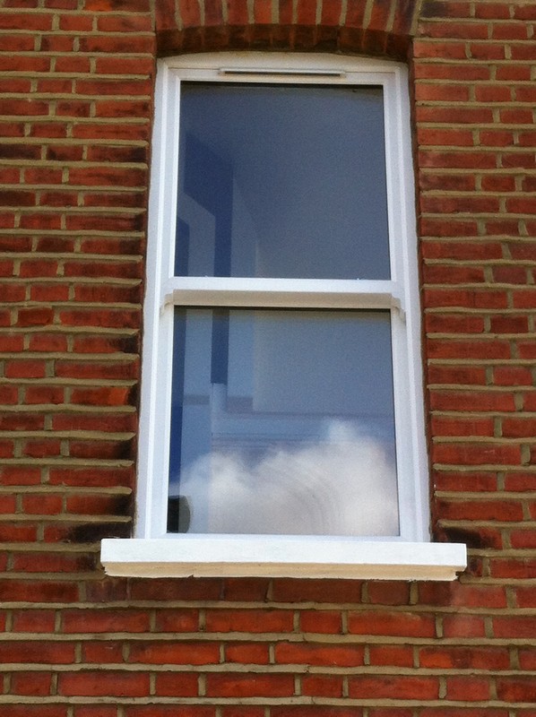 uPVC sash window on Victorian red brick house in Wokingham